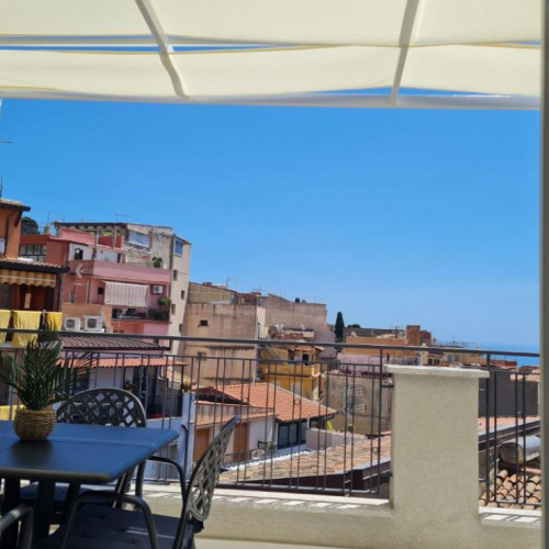 soggiorno-famiglia-taormina-quadrupla.jpg